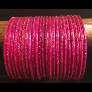 Magenta set of bangles.